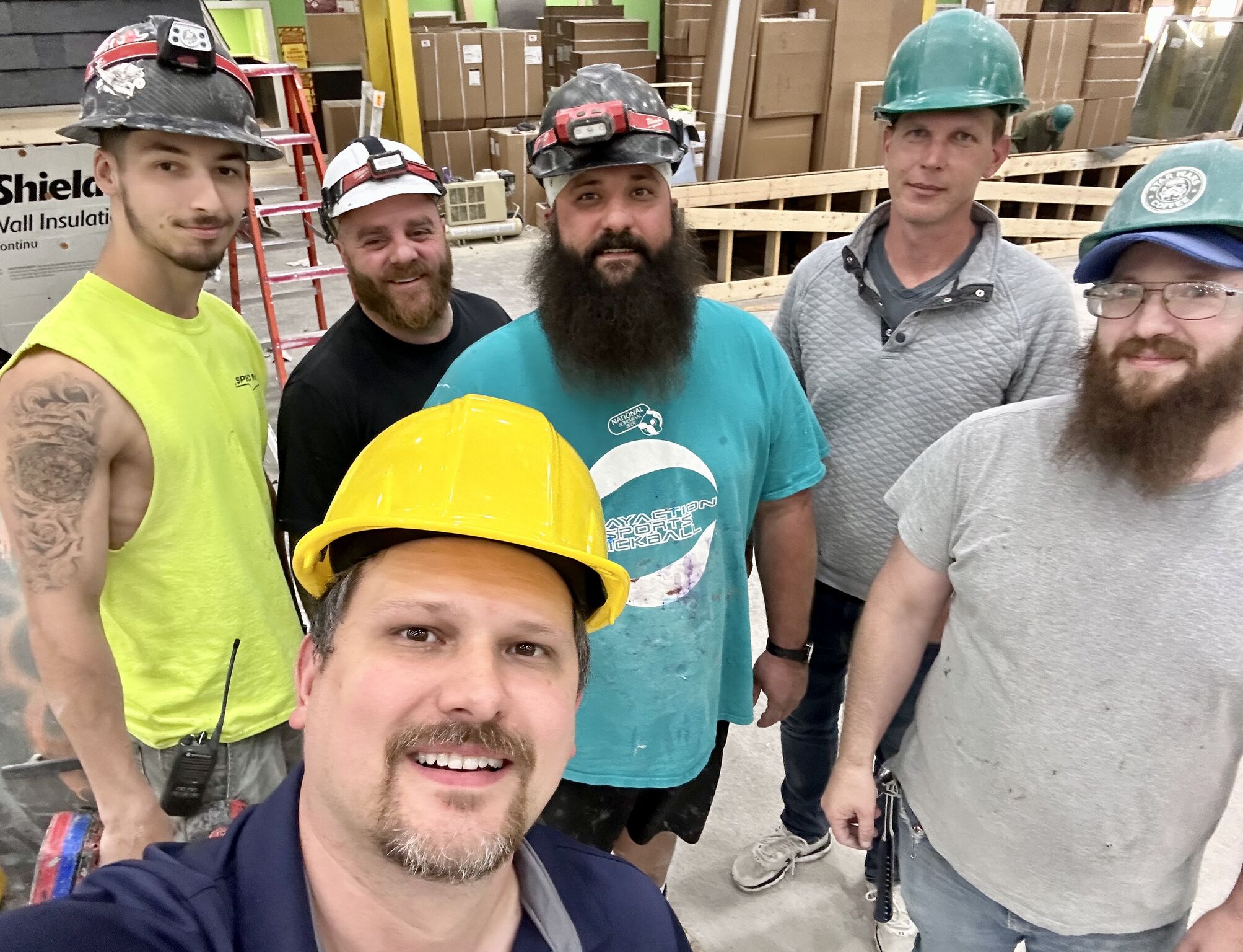 Standing with a production crew on a modular shop floor