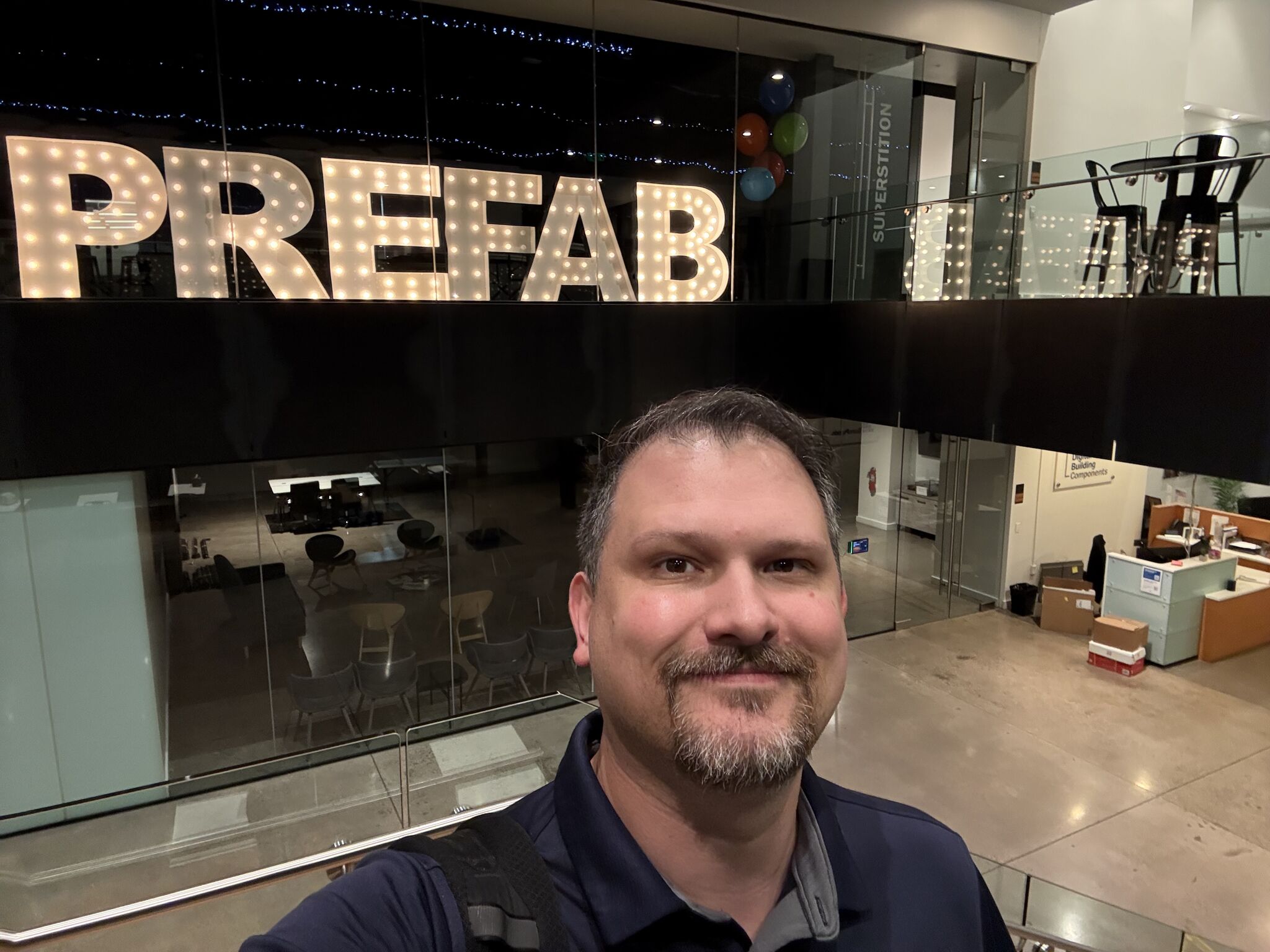 Jason Dixon on site at a prefab digital building components facility